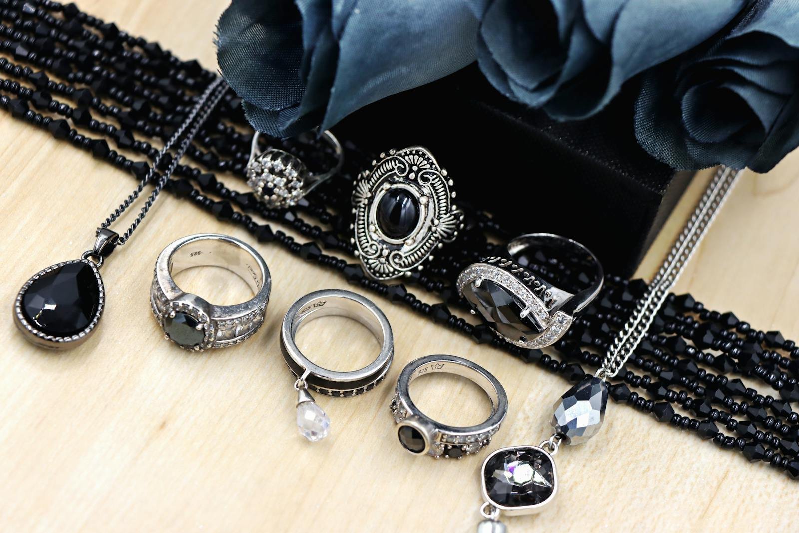 A sophisticated collection of black gemstone jewelry elegantly displayed.