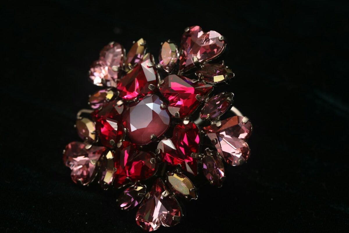 A cluster of sparkling red and pink rhinestones
