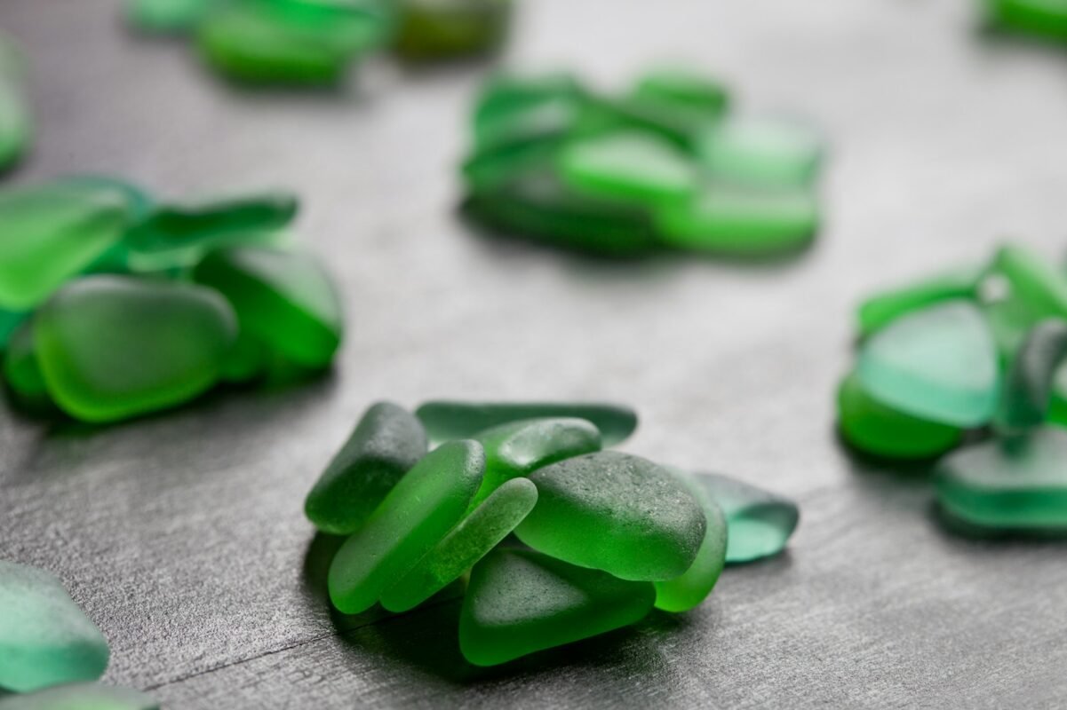 A close up of green glass pieces on a table