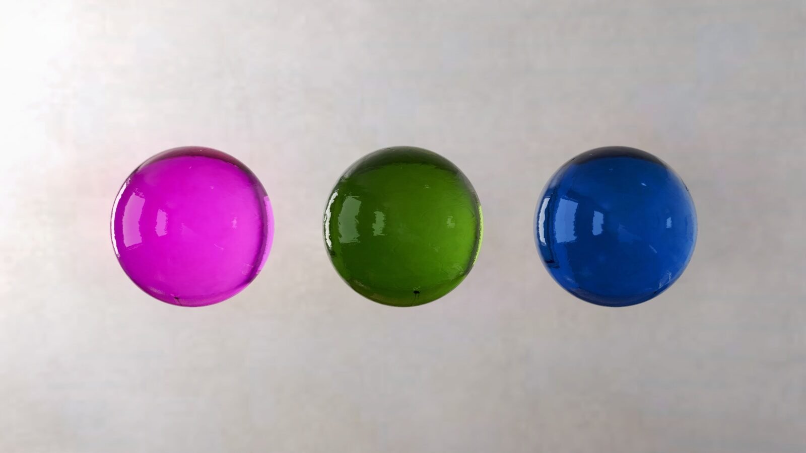 three different colored balls are in a row